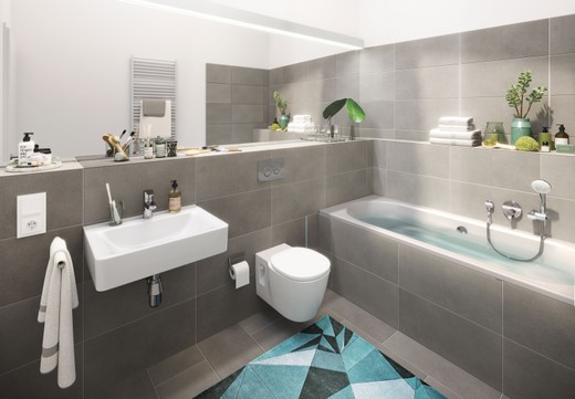 Modernes Badezimmer mit großformatigen grauen Fliesen, Badewanne, Handtuchheizung und hochwertigen Armaturen