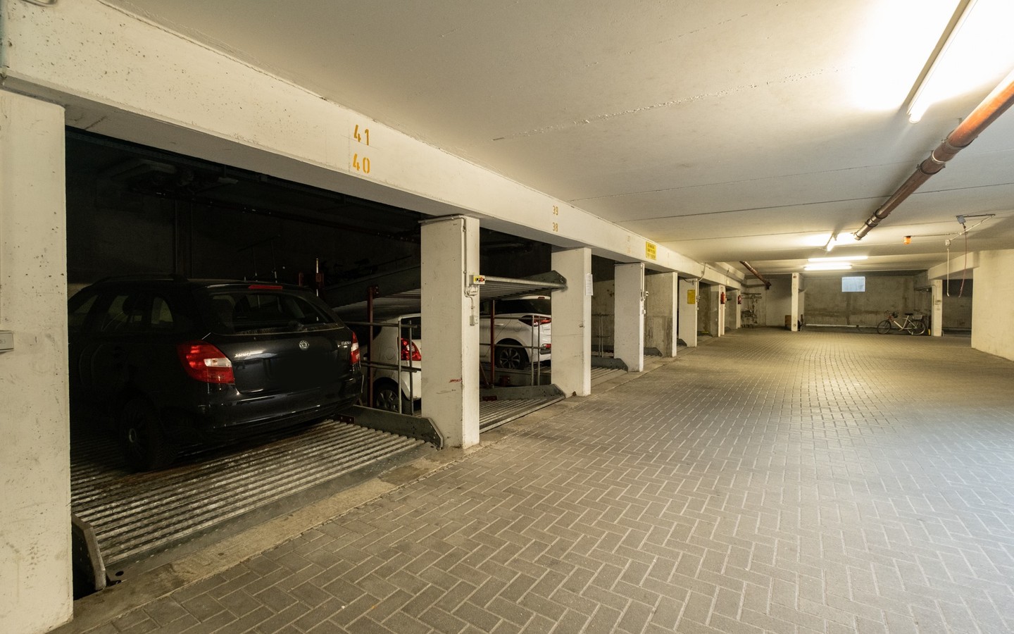 Duplex-Stellplatz (oben/Nr. 41) - HD-Kirchheim: Vermietete 1-Zimmer-Wohnung inkl. TG-Stellplatz und Terrasse