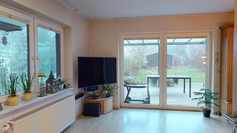 Wohnzimmer mit Terrassenzugang
				