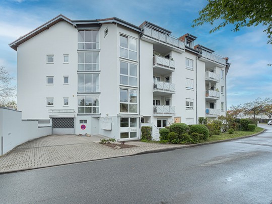 Gemütliche 2-Zimmer-Wohnung mit sonnigem Balkon und TG-Stellplatz in HD-Kirchheim - Ihr Immobilienmakler in Heidelberg
